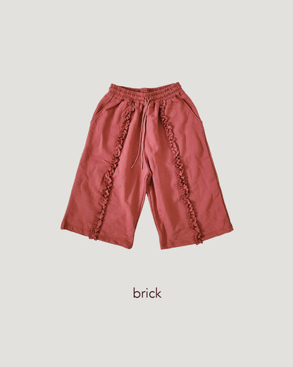 frill sweat half pants
