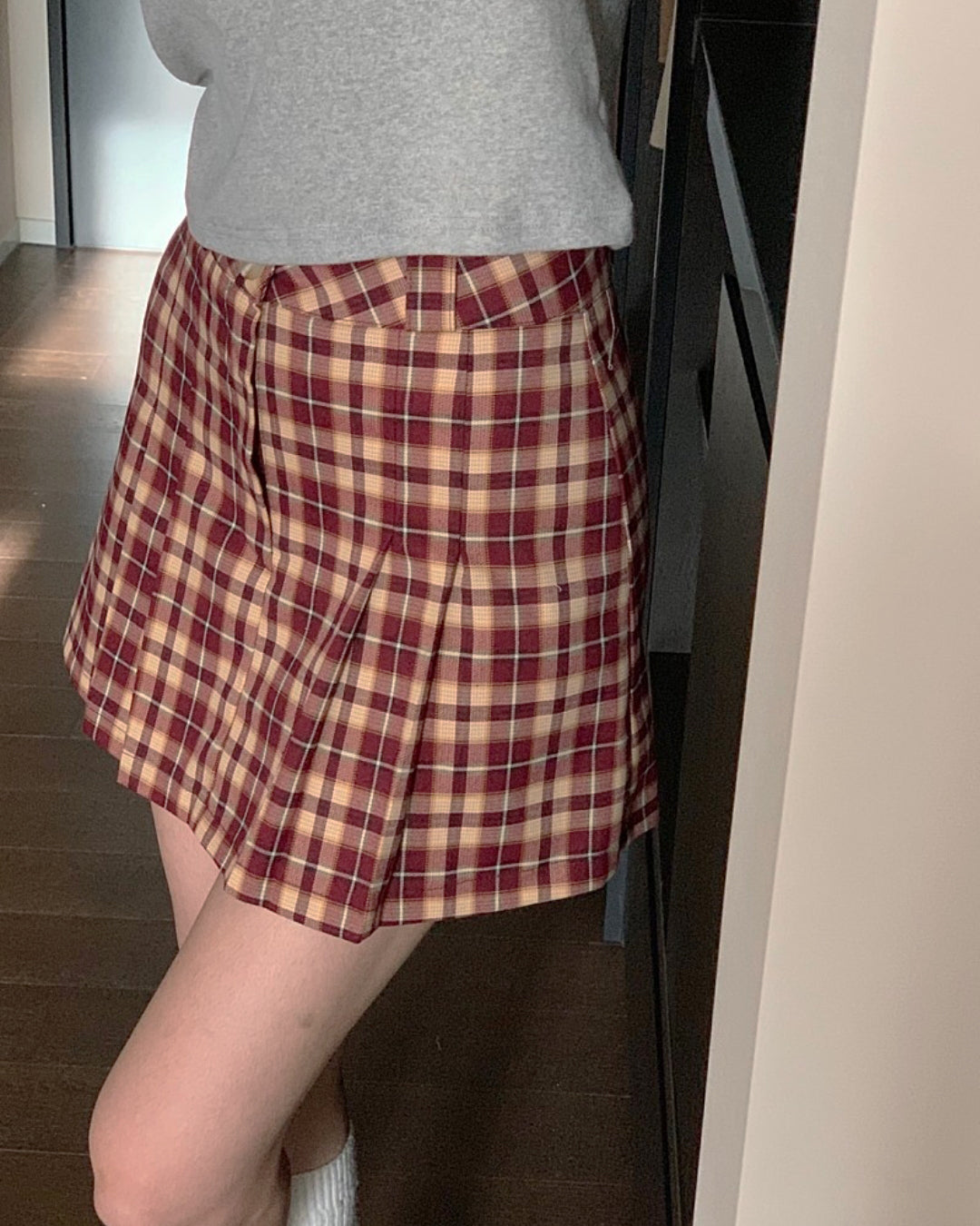 check pleated mini skirt