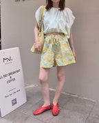 blurred flower short pants